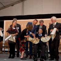 Richard DeVos with family, and President Emeritus Tom Haas, cutting the Seidman dedication ribbon.
